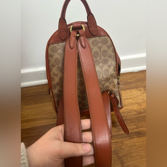 camilla convertible large leather backpack Camila This leather backpack converts Daiwa Aird 80 Baitcast Bungee color:Red bungee 50percent